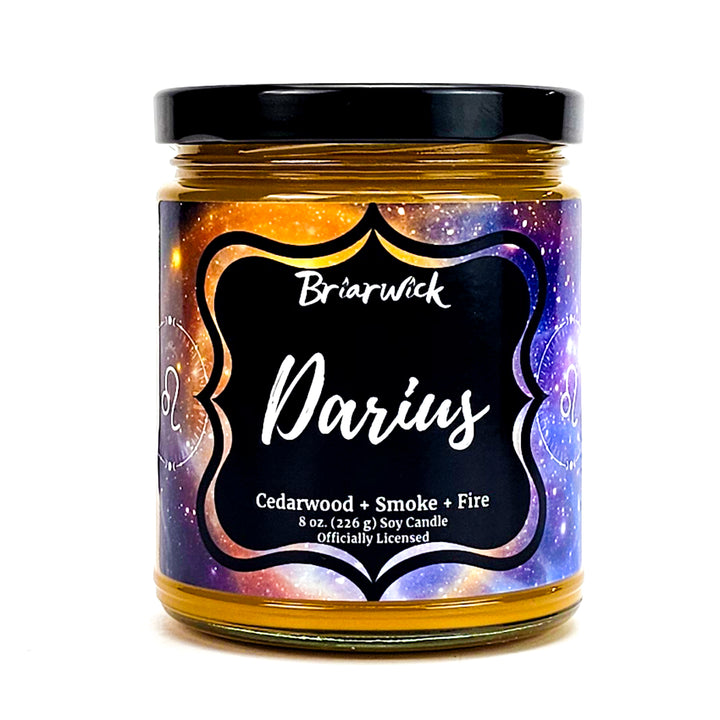 Darius 8oz mustard yellow candle with yellow galaxy leo design on a white background