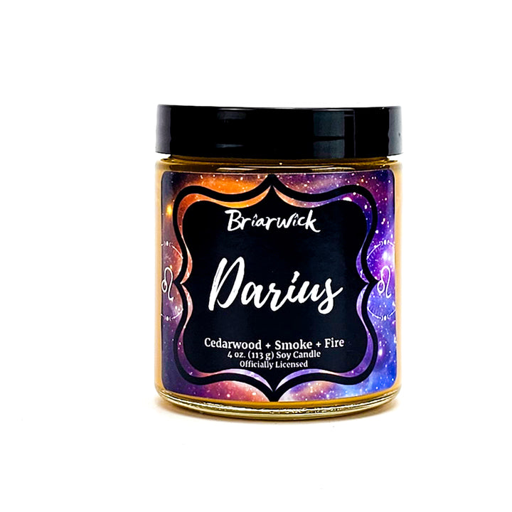 Darius 4oz mustard yellow candle with yellow galaxy leo design on a white background